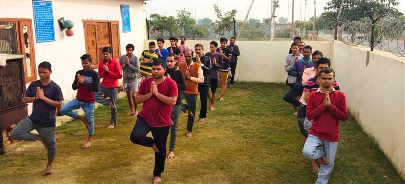 Substance abuse addicts practising yoga at a rehabilitation centre 