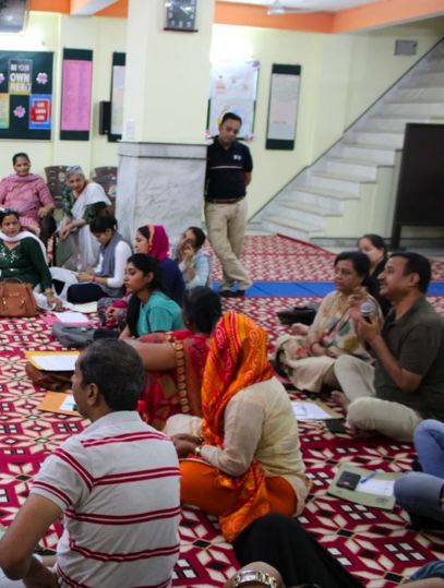 People attending a mental wellness program at a rehab centre for alcohol recovery.
