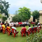 Group of people attending a recovery session at a rehab centre