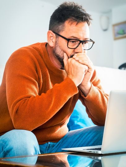 Person feeling sad and tense while searching for rehab in India.