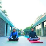Women practicing meditation at a luxury rehab center in India