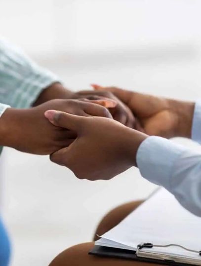 Therapist supporting an alcohol addict with counseling at a luxury rehab center