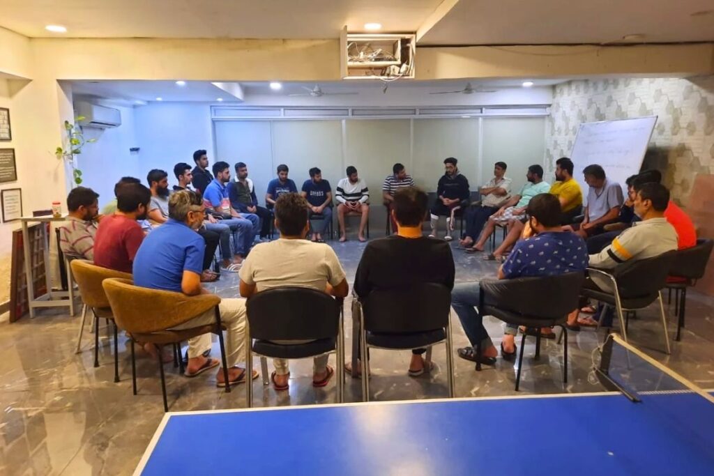 People from all walks of life in a group therapy session