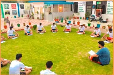 A residence in Odisha where people sitting in a close circle for an alcohol rehab program