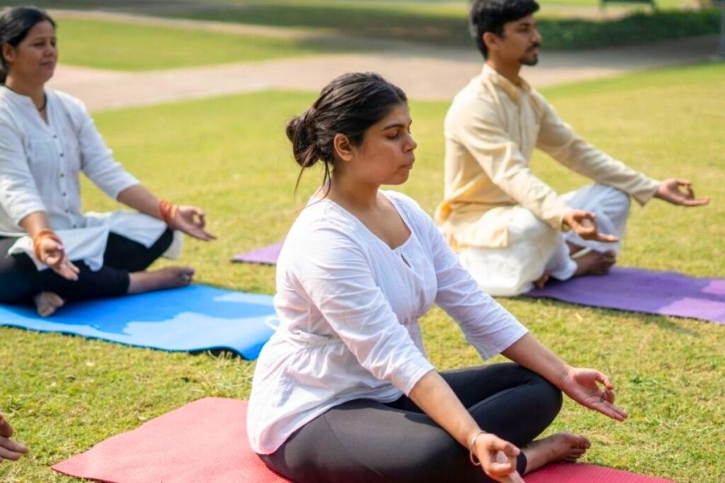 A patient practicing yoga at a luxury rehab centre in Delhi NCR. Calm. Focused. Free.