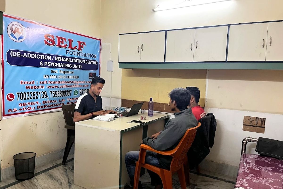 People discussing treatment options at a rehab centre in Kolkata