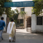 A family walking towards rehab centre.