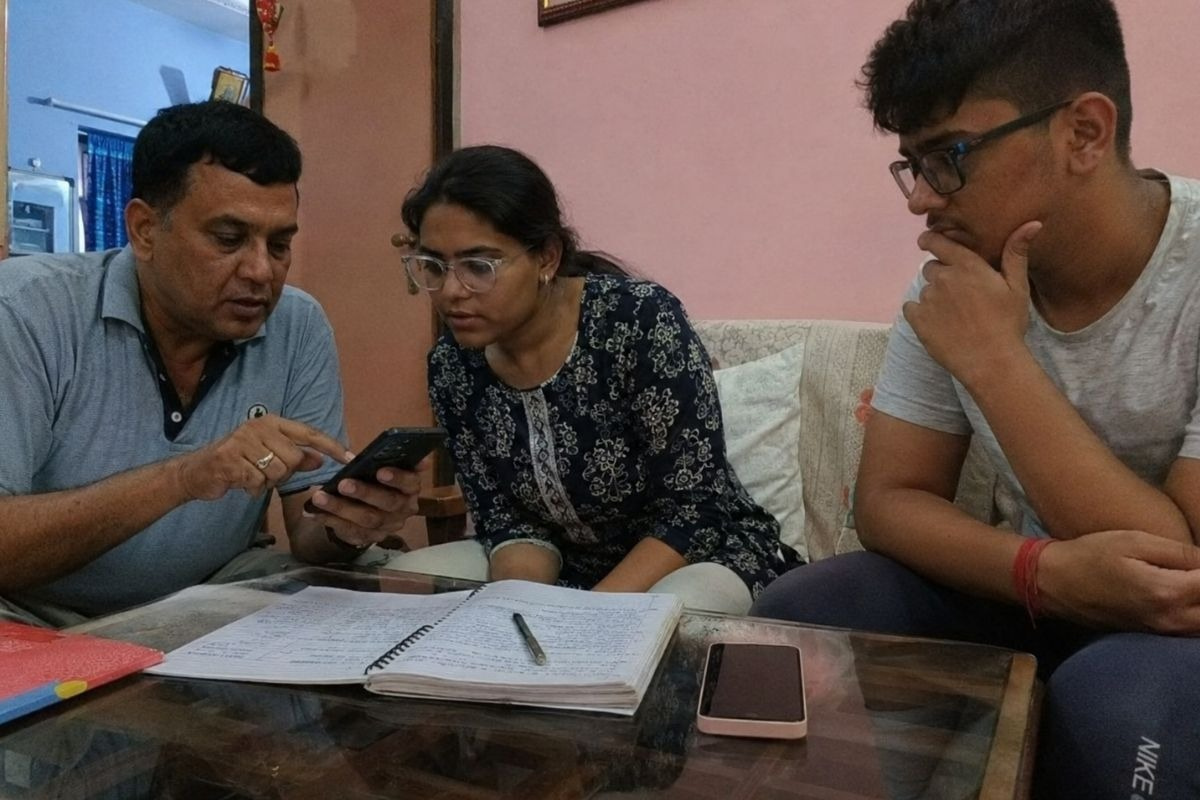 Family reviewing expenses before choosing a Trustworthy Rehab Centre in India.