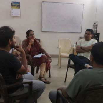 Medical staff explaining costs at a Trustworthy Rehab Centre in India.