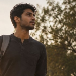 Student carrying books at Rehab Centers That Allow Patients to Continue Their Online Education While Admitted.